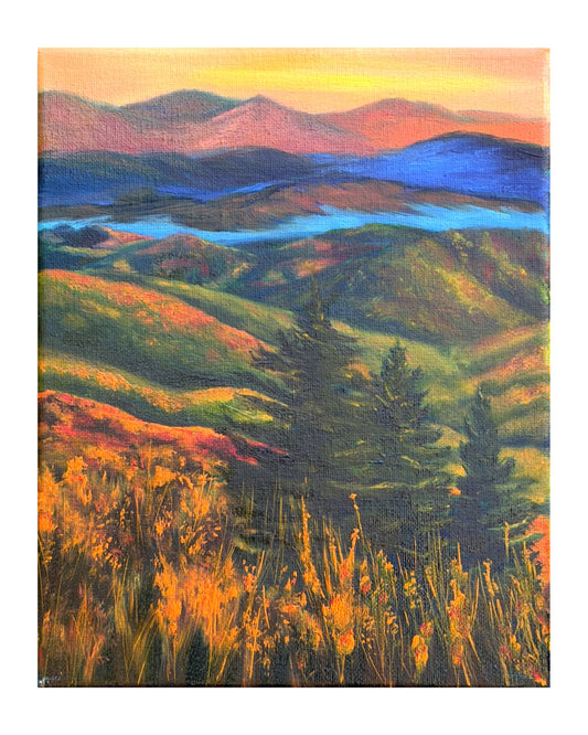 Oil painting of a landscape with rolling hills, trees, and a river in-between the mountains at sunset.