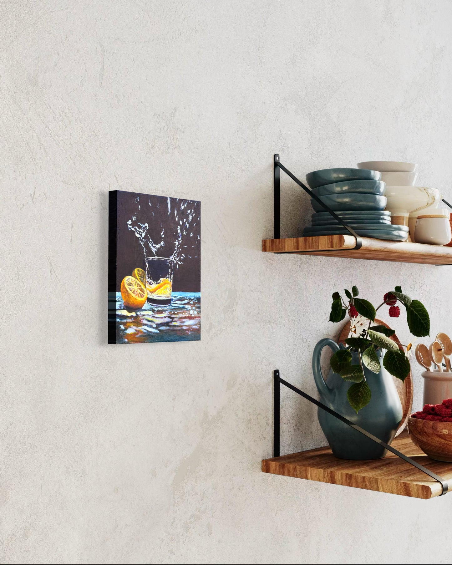 Canvas oil painting of a glass of water with lemon slices dropped in the water creating splashes on a wall. It's hanging on the wall next to wooden shelves with kitchen items.