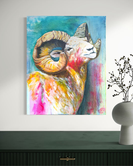 Colorful oil painting of a ram on a wall above a black cabinet.